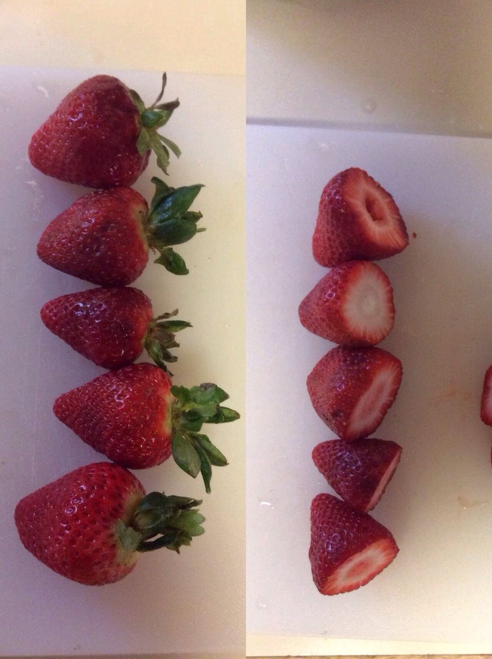 Chop off the green leaf on the strawberries.
