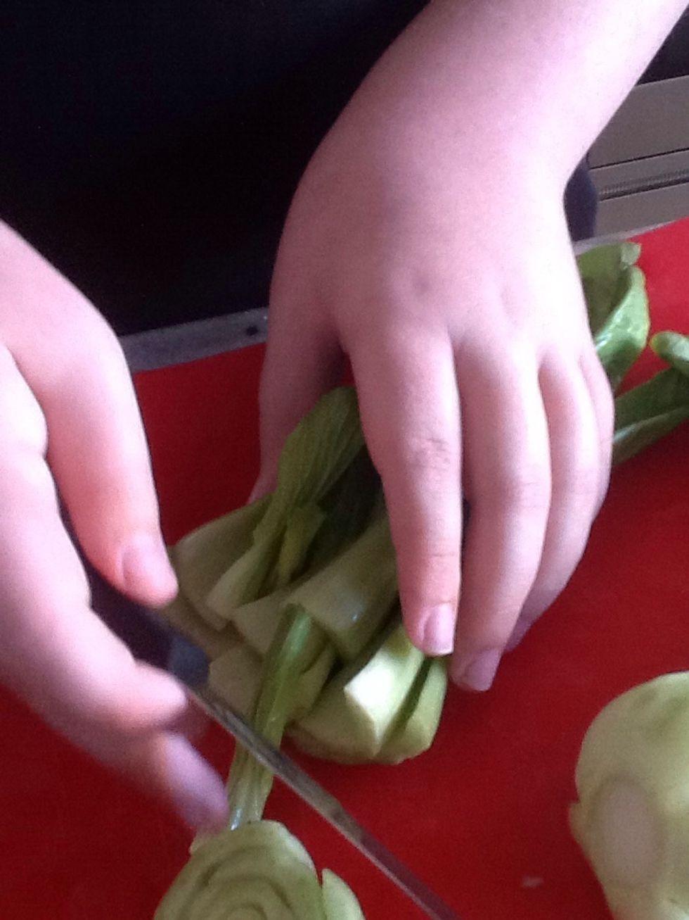 Chop off the the end of the stem off then cut the rest of the choy sum up.