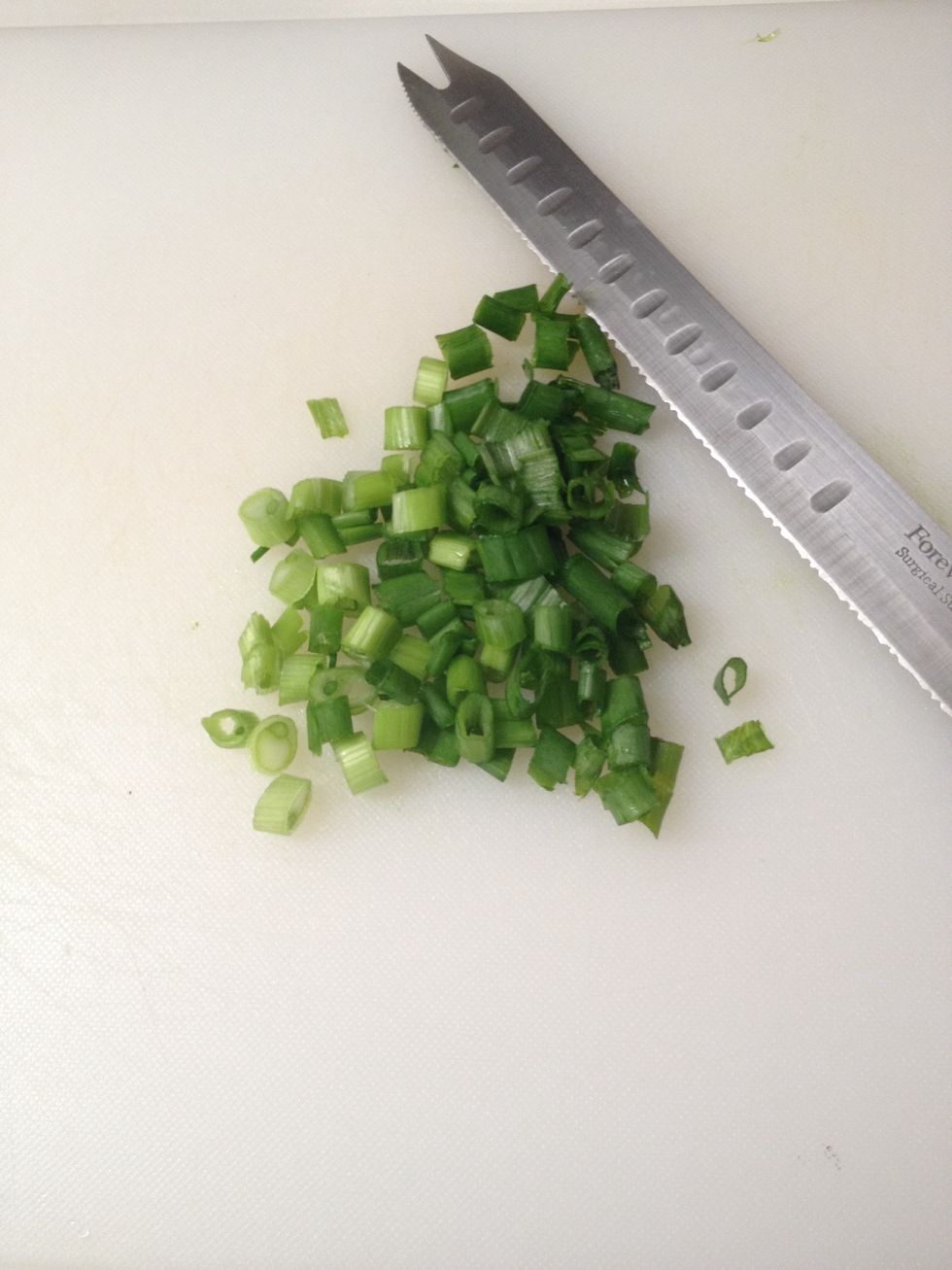 Chop one green onion.