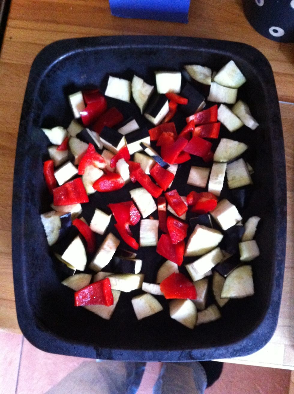 Chop one of the peppers and add to the aubergine.