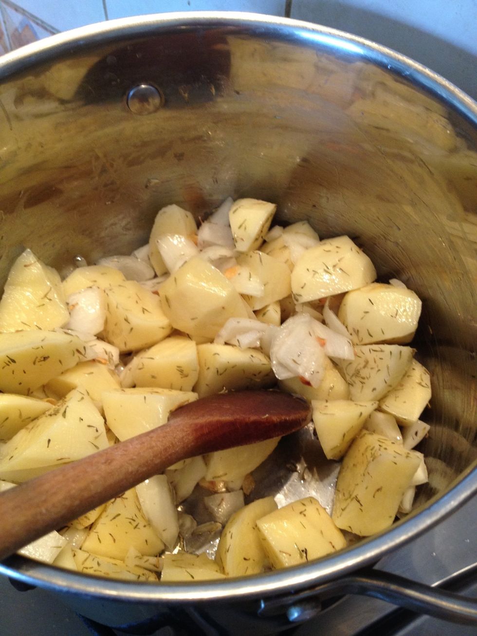 Chop onion, 3 cloves of garlic, peel and roughly chop potatoes and put in pot with a little oil and thyme. Cook on a very low temp for 7-10 minutes. For extra spice add finely chopped scotch bonnet.