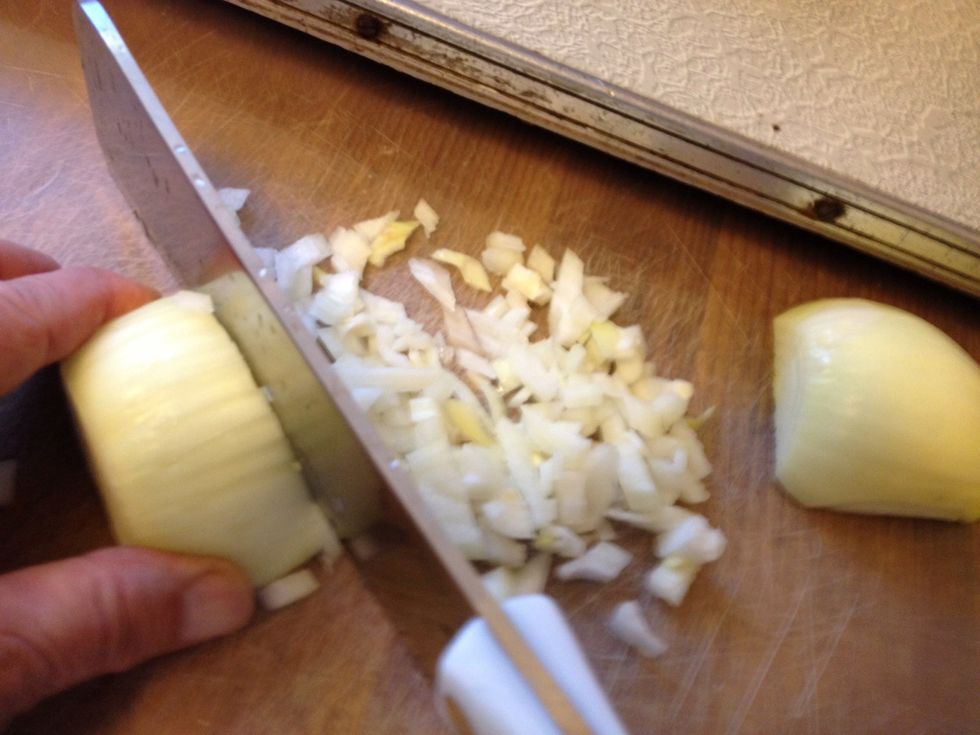 Chop onion. About one medium onion per four medium potatoes.