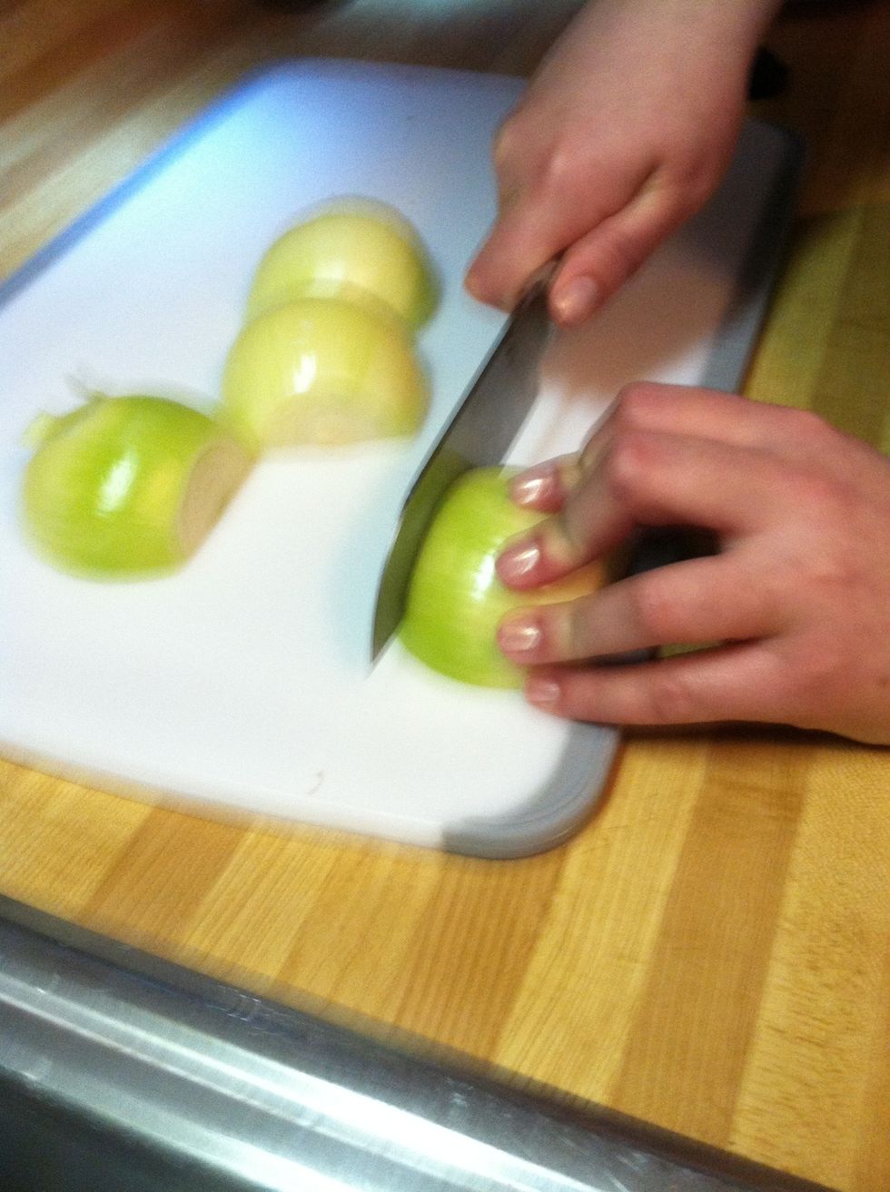 Chop onion into long strips.