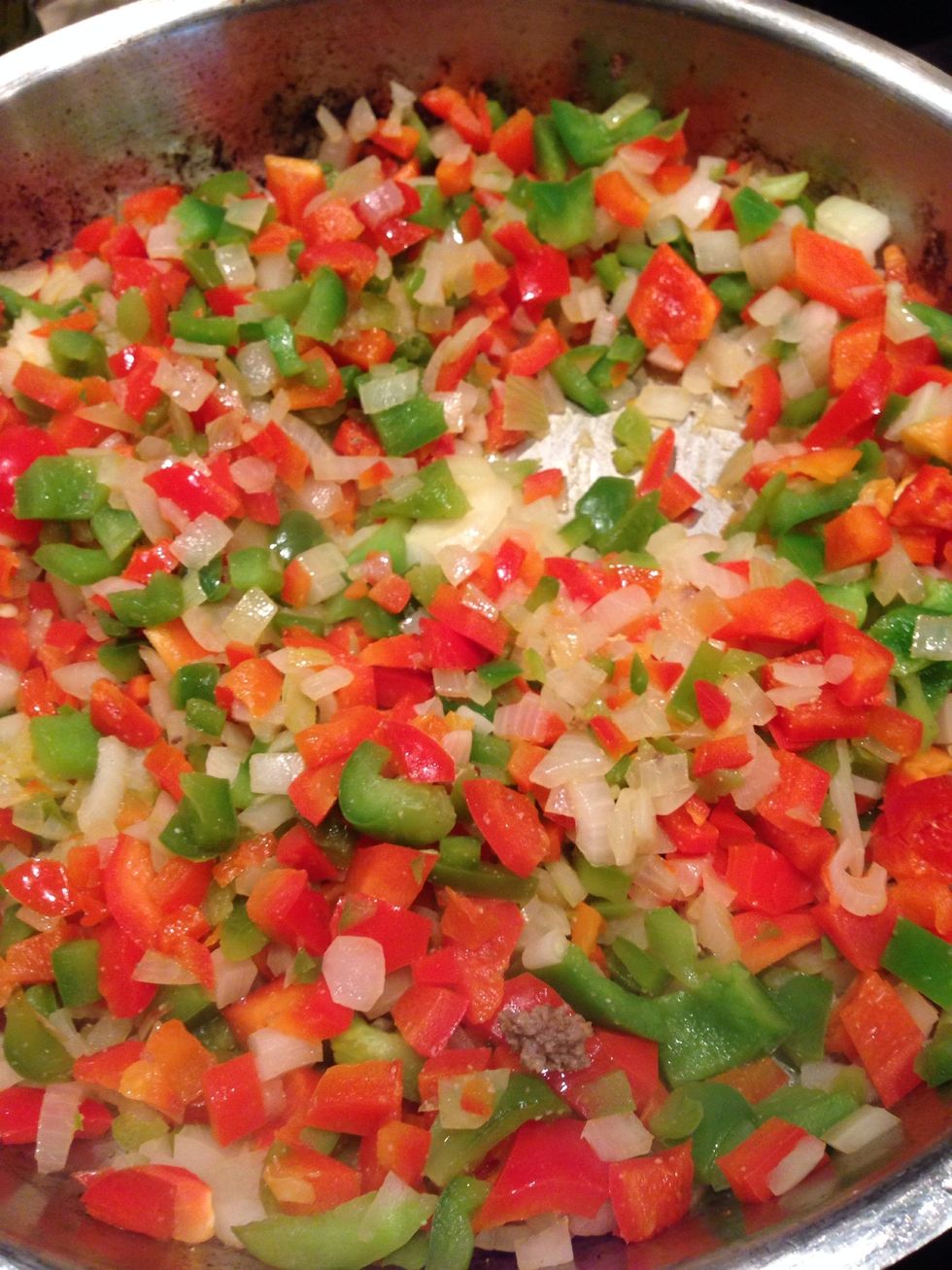 Chop onions and bell peppers finely and saut\u00e9 in oil until tender