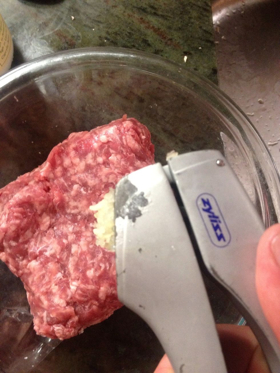 Chop or press the garlic. Pressing is faster and releases more flavor.