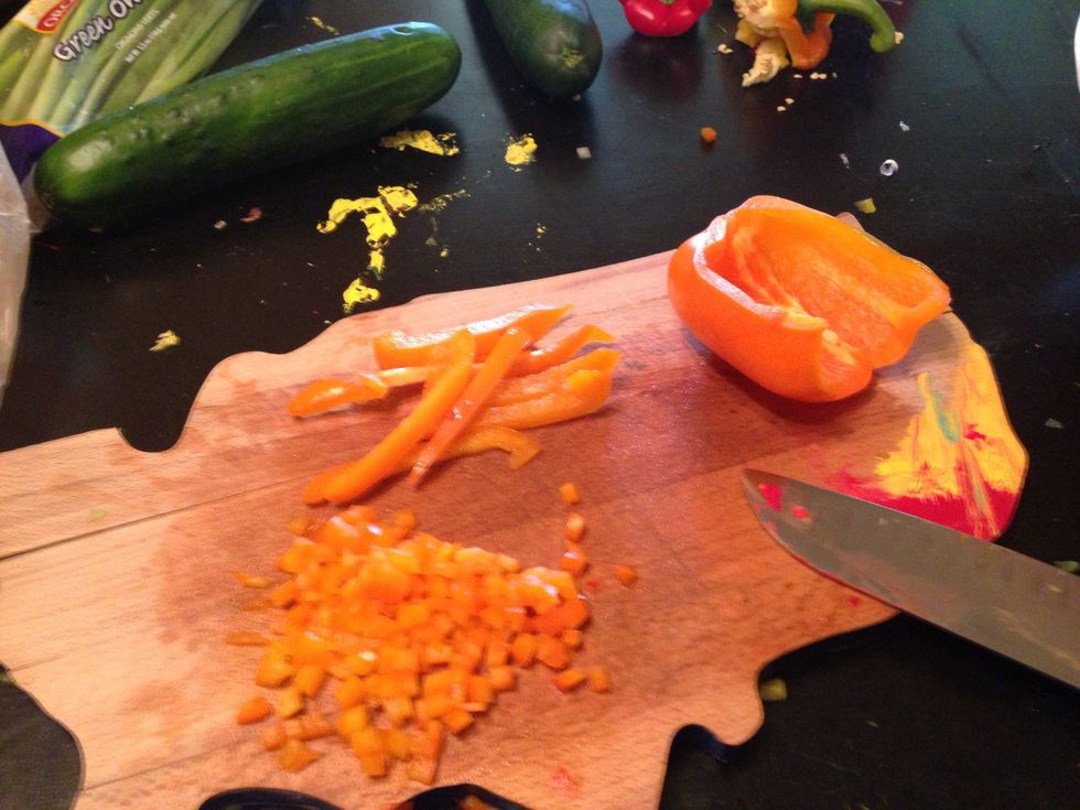 Chop orange peppers
