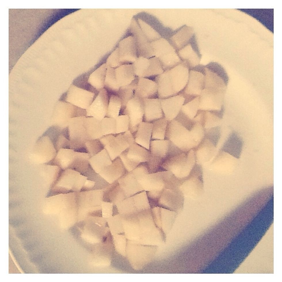 Chop peeled pears into small cubes. Be careful not to cut yourself