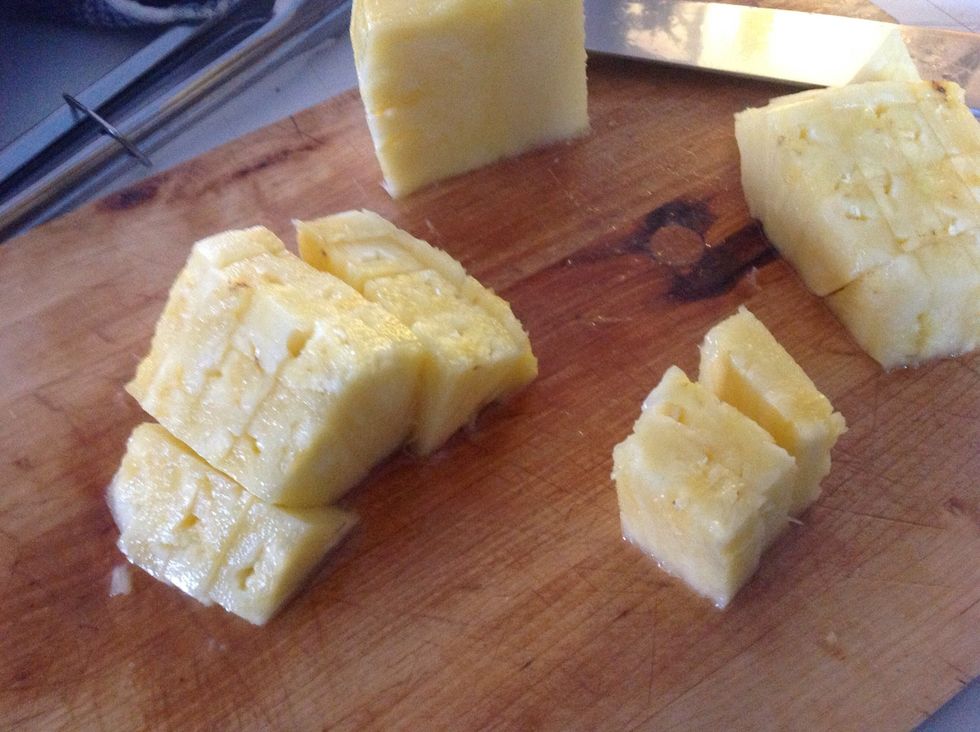 Chop pineapple into medium chunks