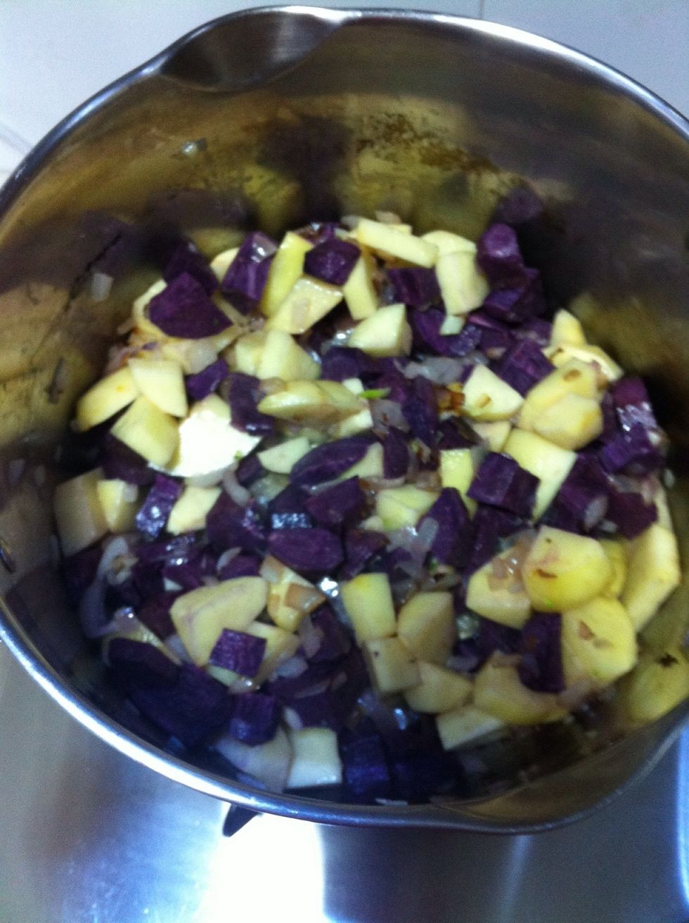 Chop potatoes, add to onion and stir for about 12 min. The potatoes should become softer.