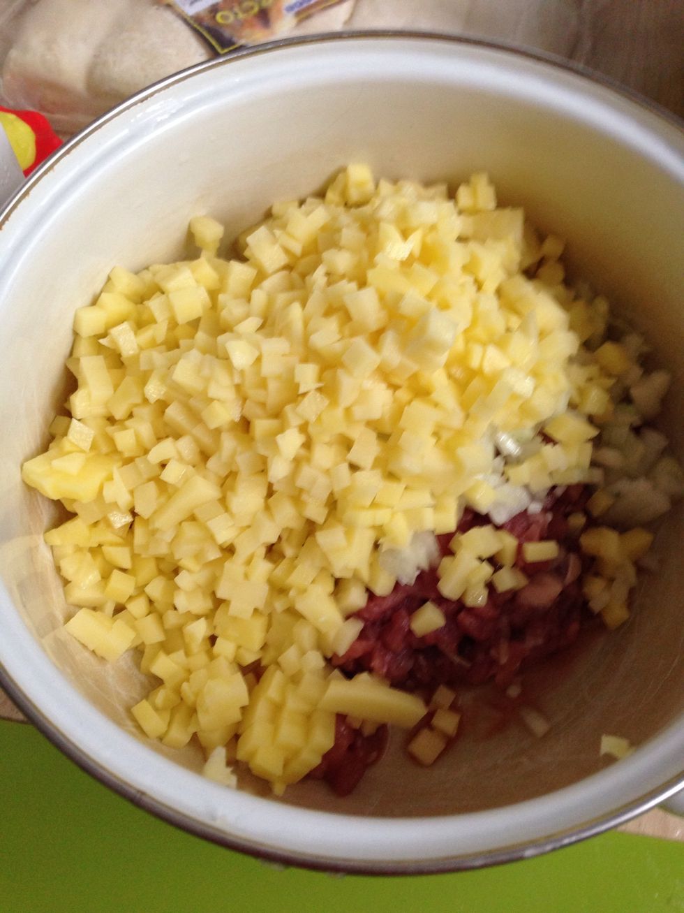 Chop potatoes into small cubes