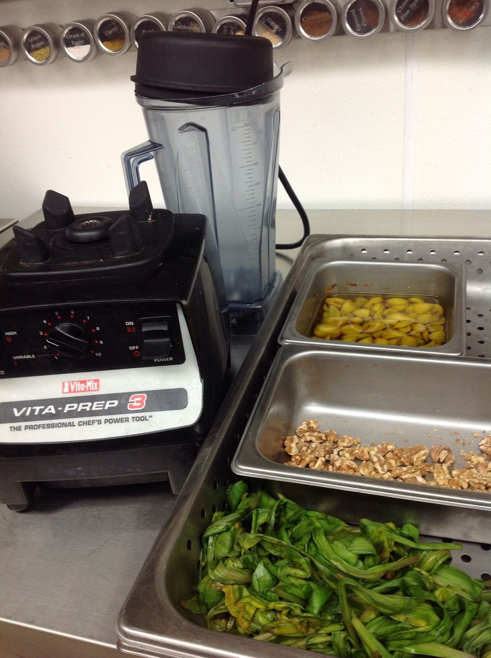 Chop ramp leaves then put in blender, add salt and pepper then add roasted garlic and some of its oil and the walnuts. Blend slow speed so you don't heat and add more oil as needed.