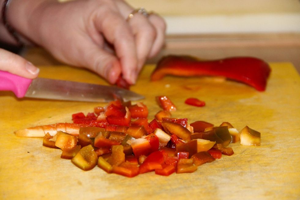 Chop red peppers in small pieces.