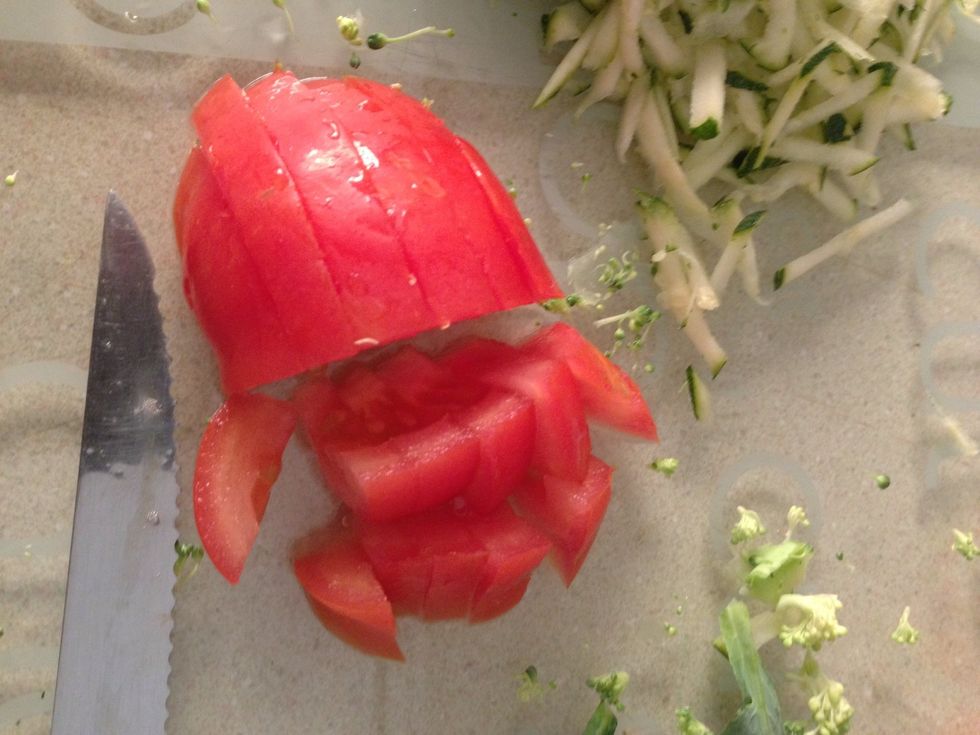 Chop some tomato into small bite sizes