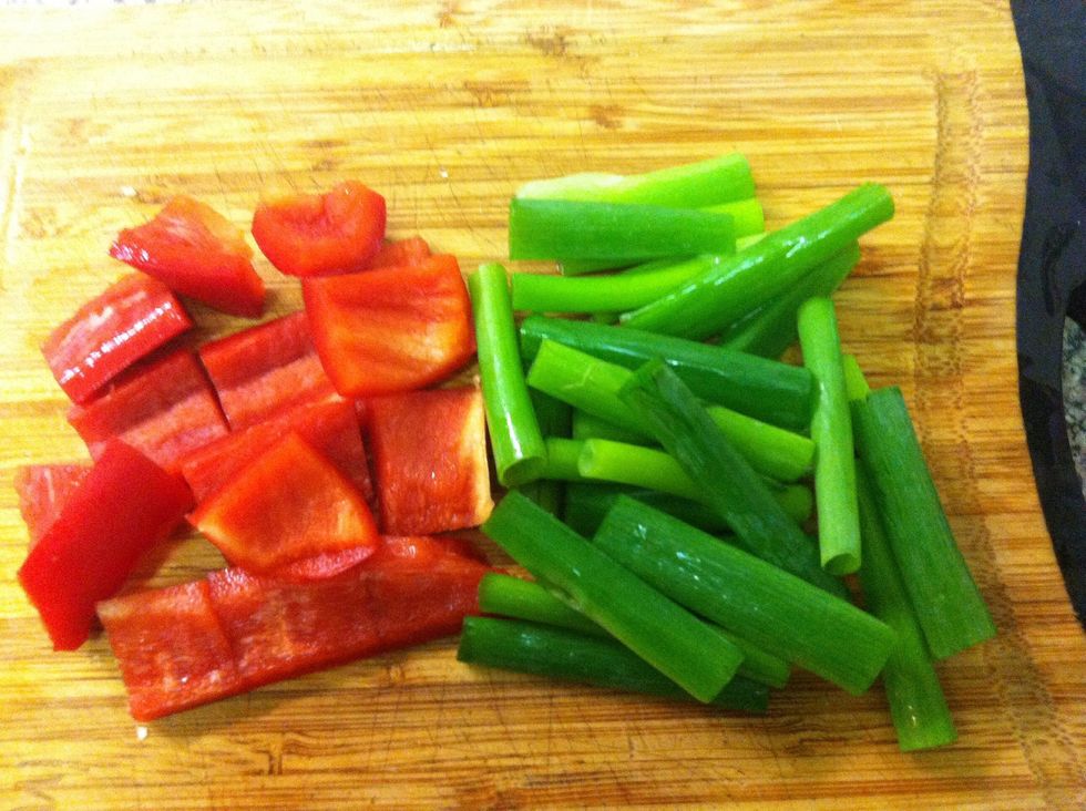 Chop spring onion and capsicum