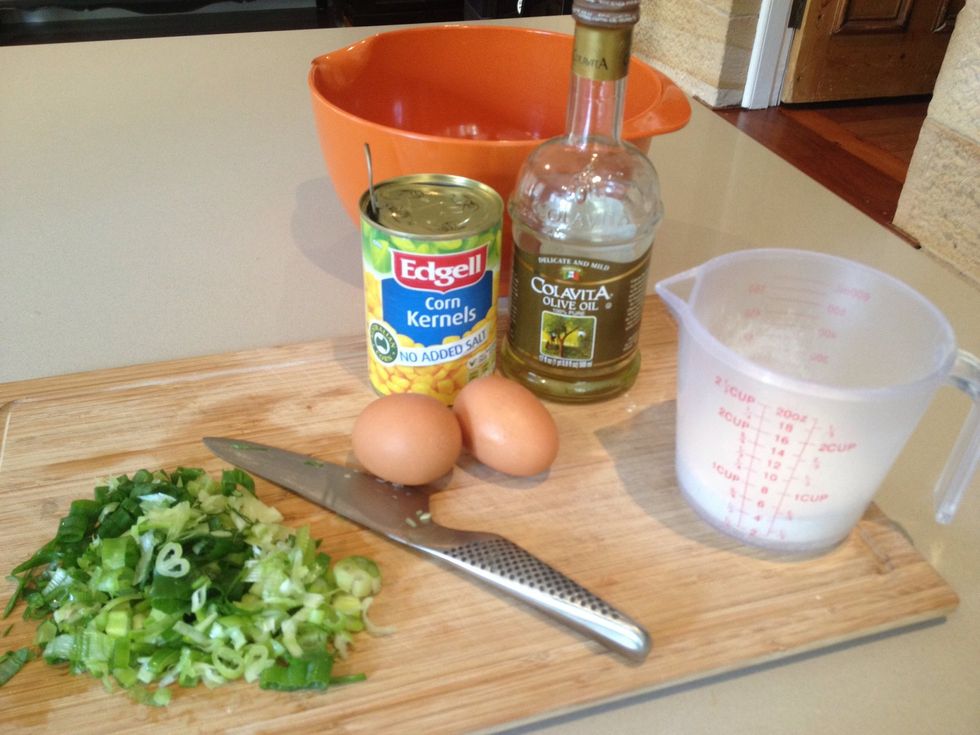 Chop spring onions finely. Dice ham and avocado and chop parsley. Measure 1/2 cup of plain flour