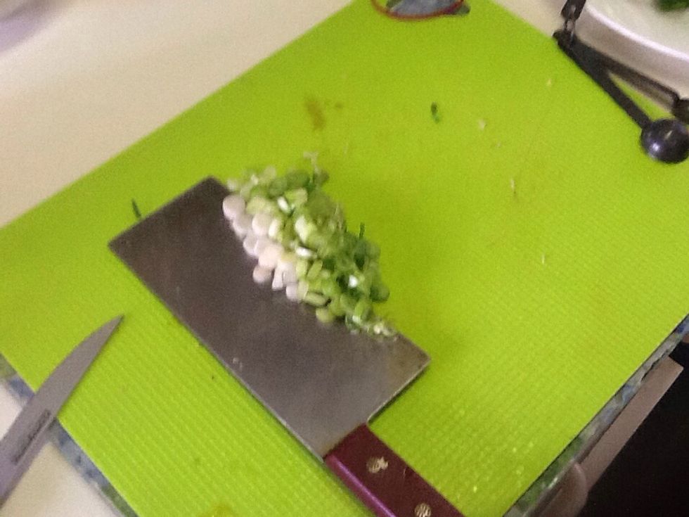 Chop spring onions