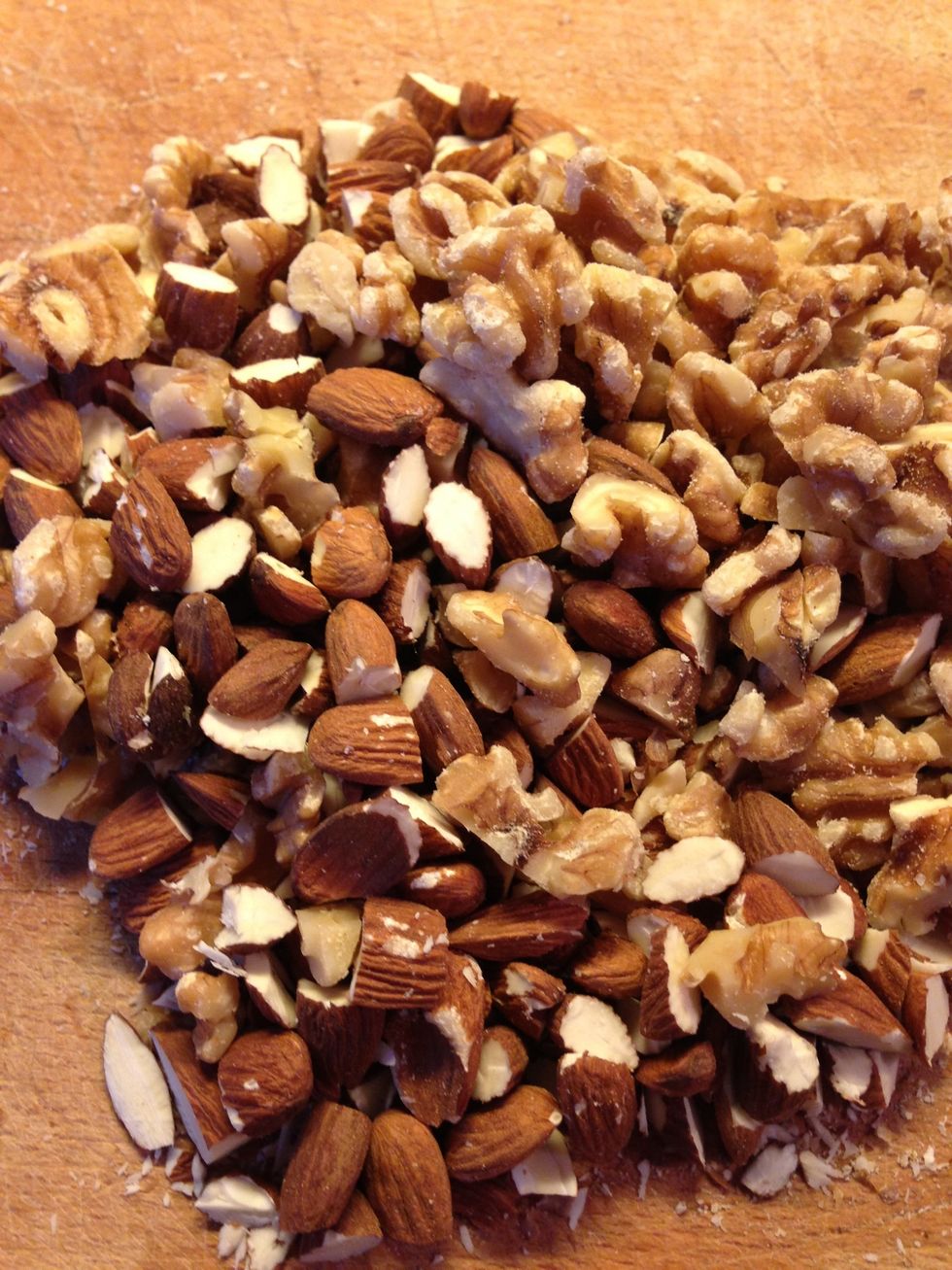 Chop the almonds and walnuts roughly. This will make the bread easier to cut.