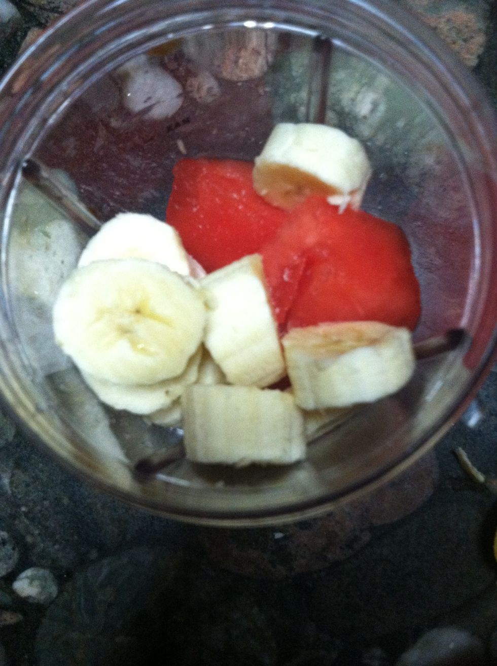 Chop the banana into pieces and add it to the blender cup!