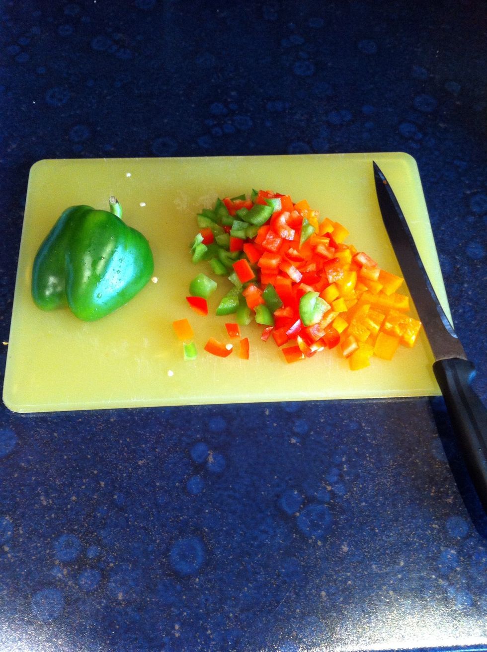 Chop the bell peppers into small squares this will be part of the stuffing (use whatever colour you like)