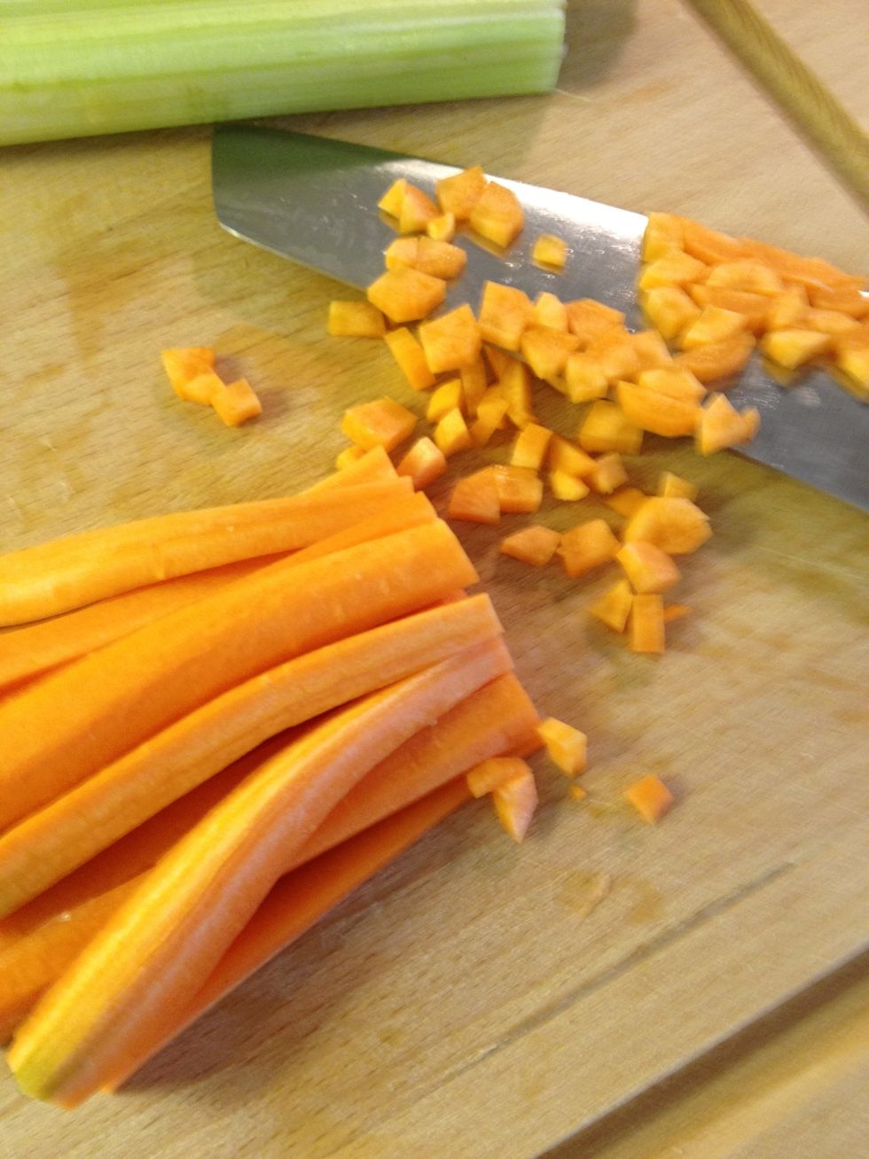 Chop the carrots inte small pieces . .