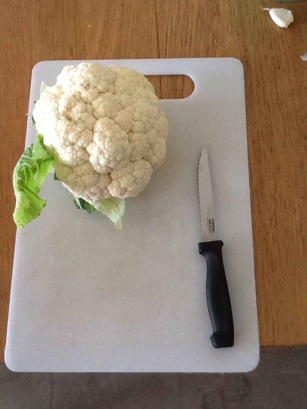 Chop the cauliflower into small pieces to for into the blender.....