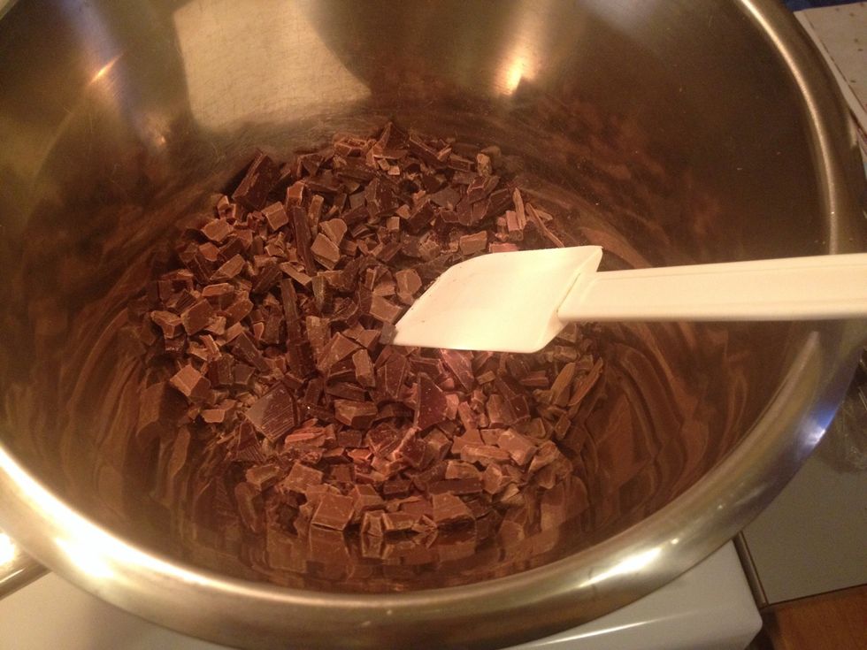 Chop the chocolate and put in a double boiler or over a water-bath.