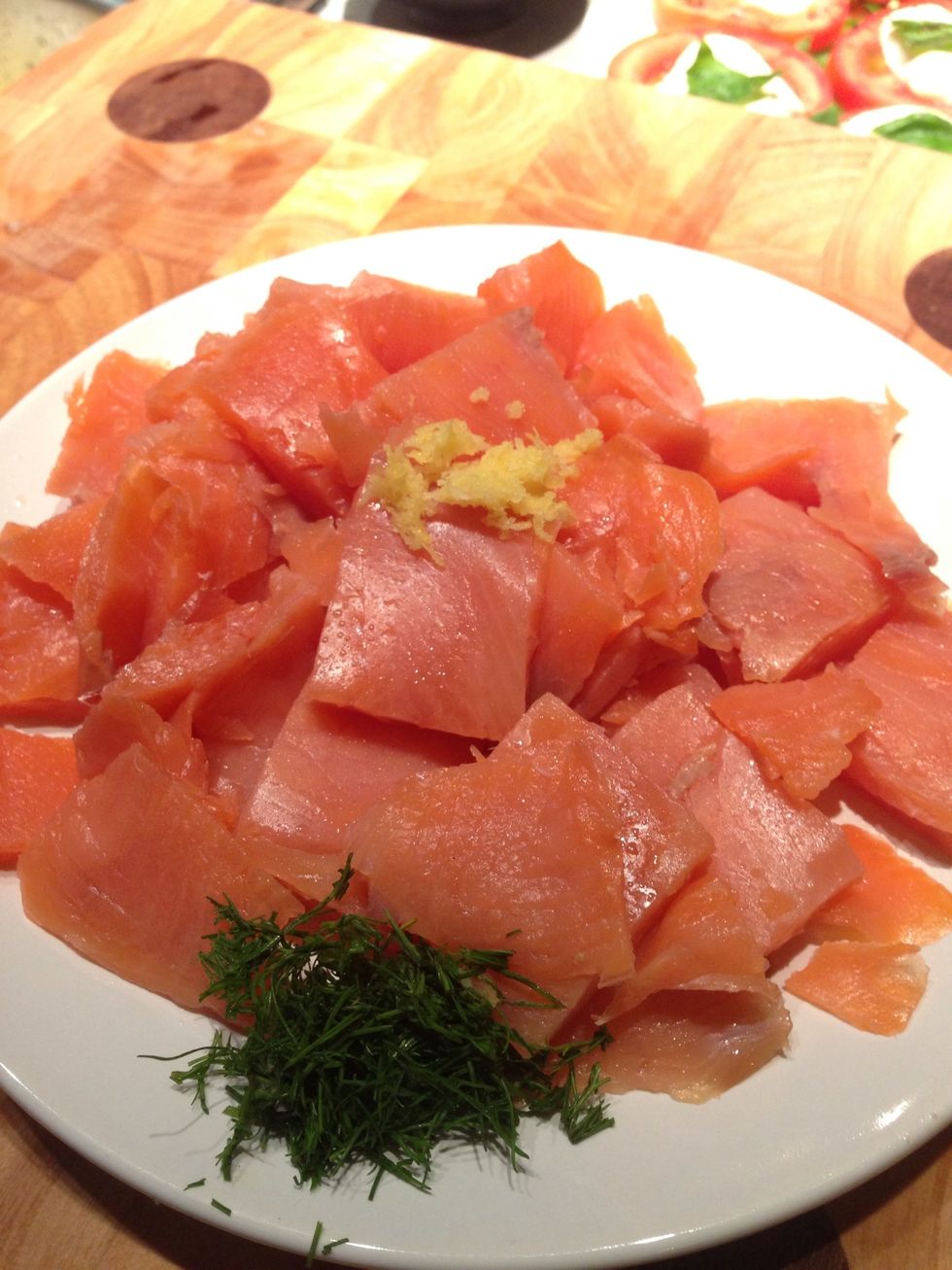 Chop the dill, cut the salmon into chunks, place the 1/2 lemon zest into 1 plate. Set aside. This will be used for tossing later.