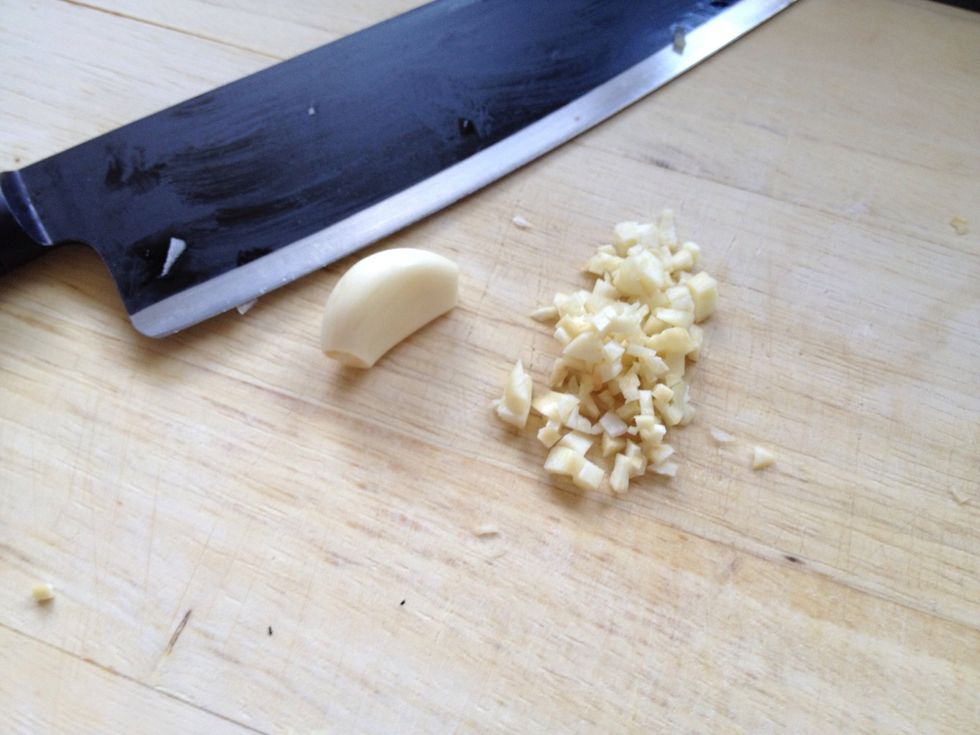 Chop the galic cloves.