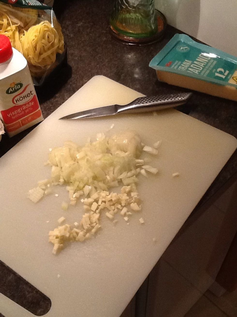 Chop the garlic and onion.\ud83d\ude0f