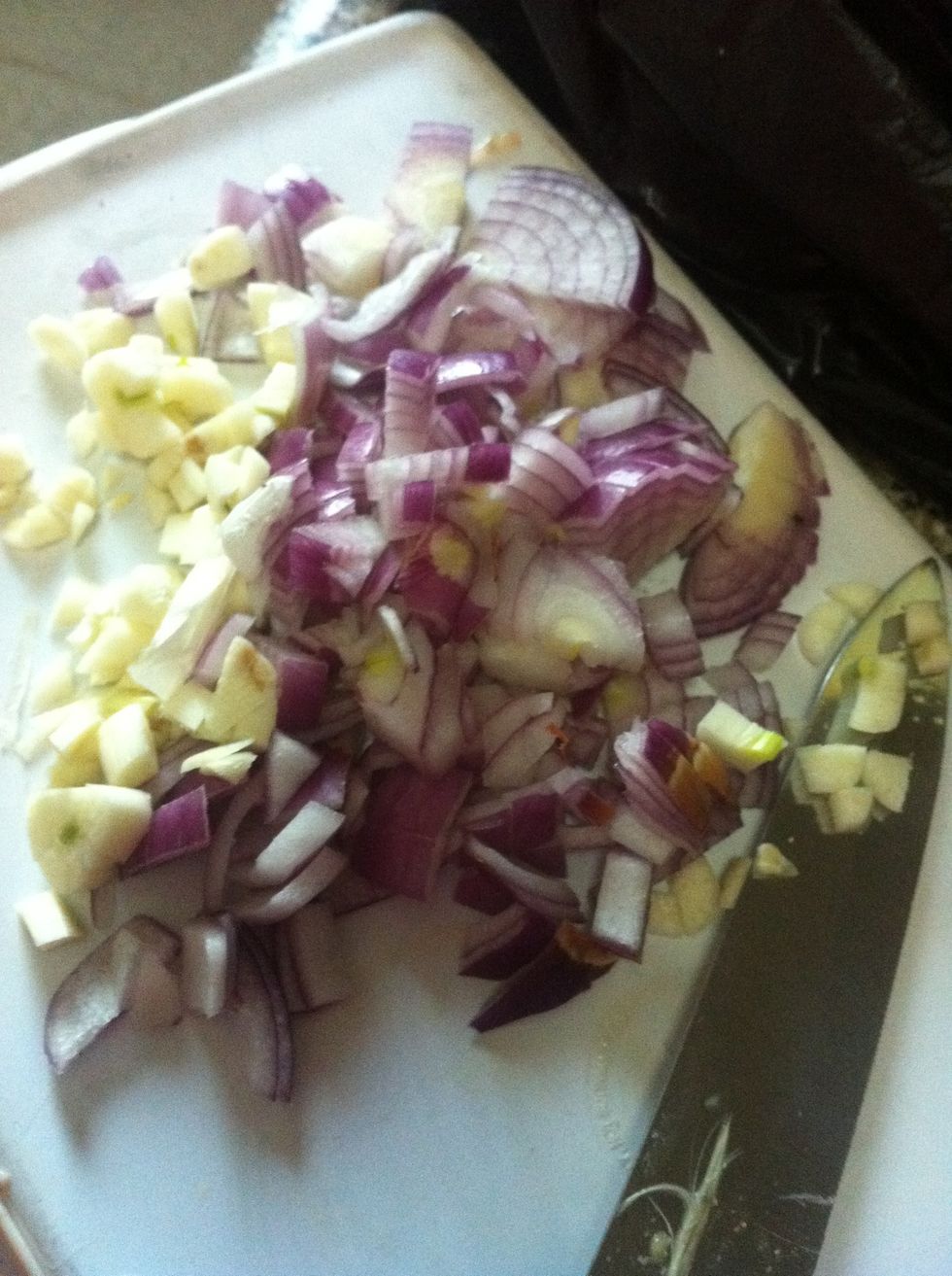 Chop the garlic and onions .