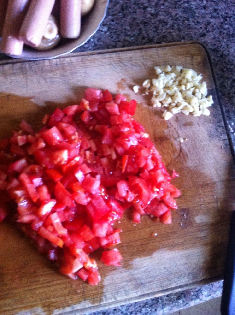 Chop the garlic and tomato