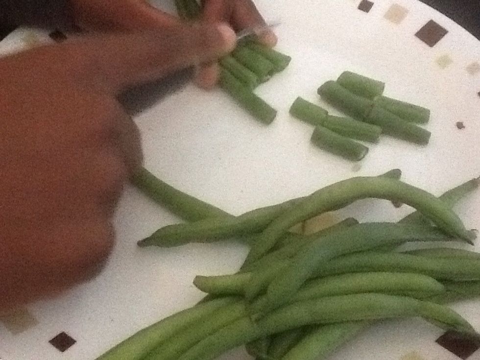 Chop the green beans.