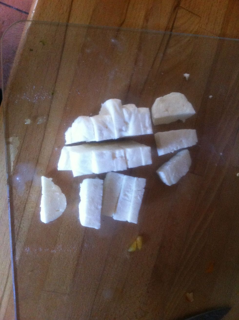Chop the halloumi into small pieces and put them in the third roasting tin but no oil. Put all three tins in the grill/oven for 10 minutes .