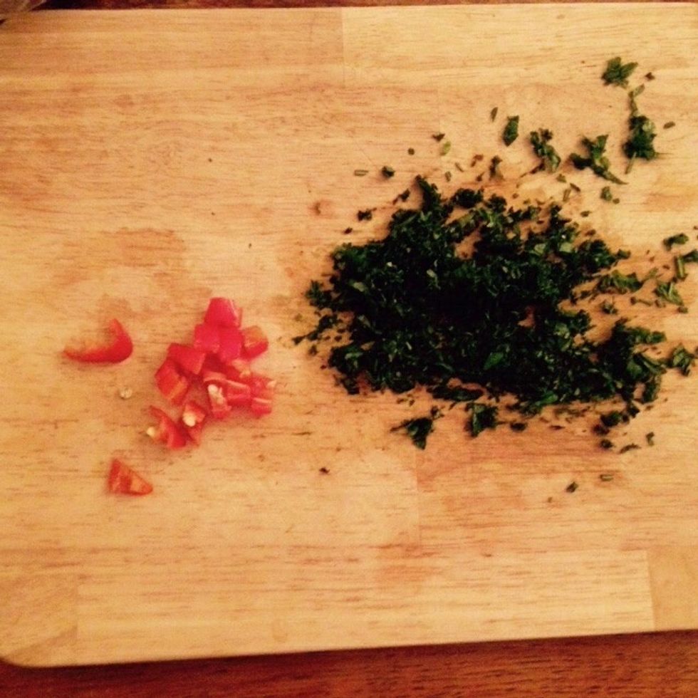 Chop the herbs finely and the chilly