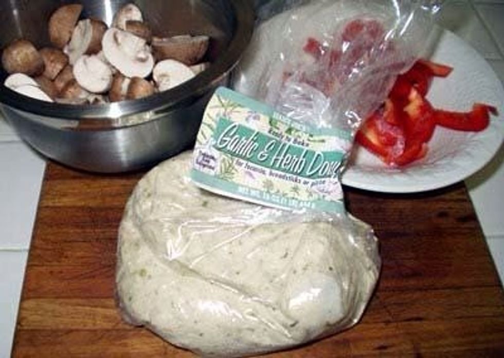 Chop the mushrooms in half and julienne the bell pepper. Pull out the dough if you are using store bought dough. Let the veggies marinate for at least an hour.