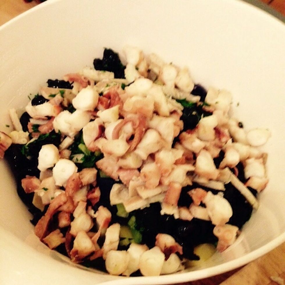 Chop the octopus pieces into smaller bits, approximately the same size of the potatoes.