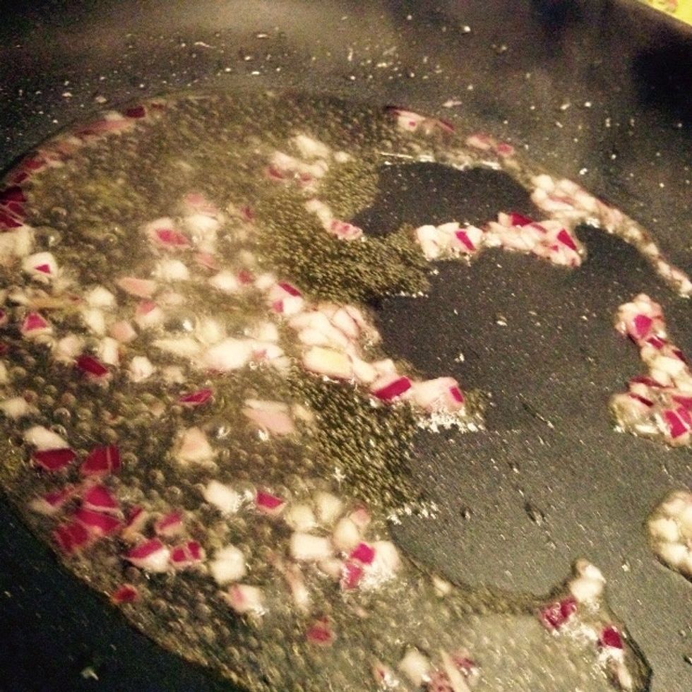 Chop the onion and add it to a pan with some olive oil and water