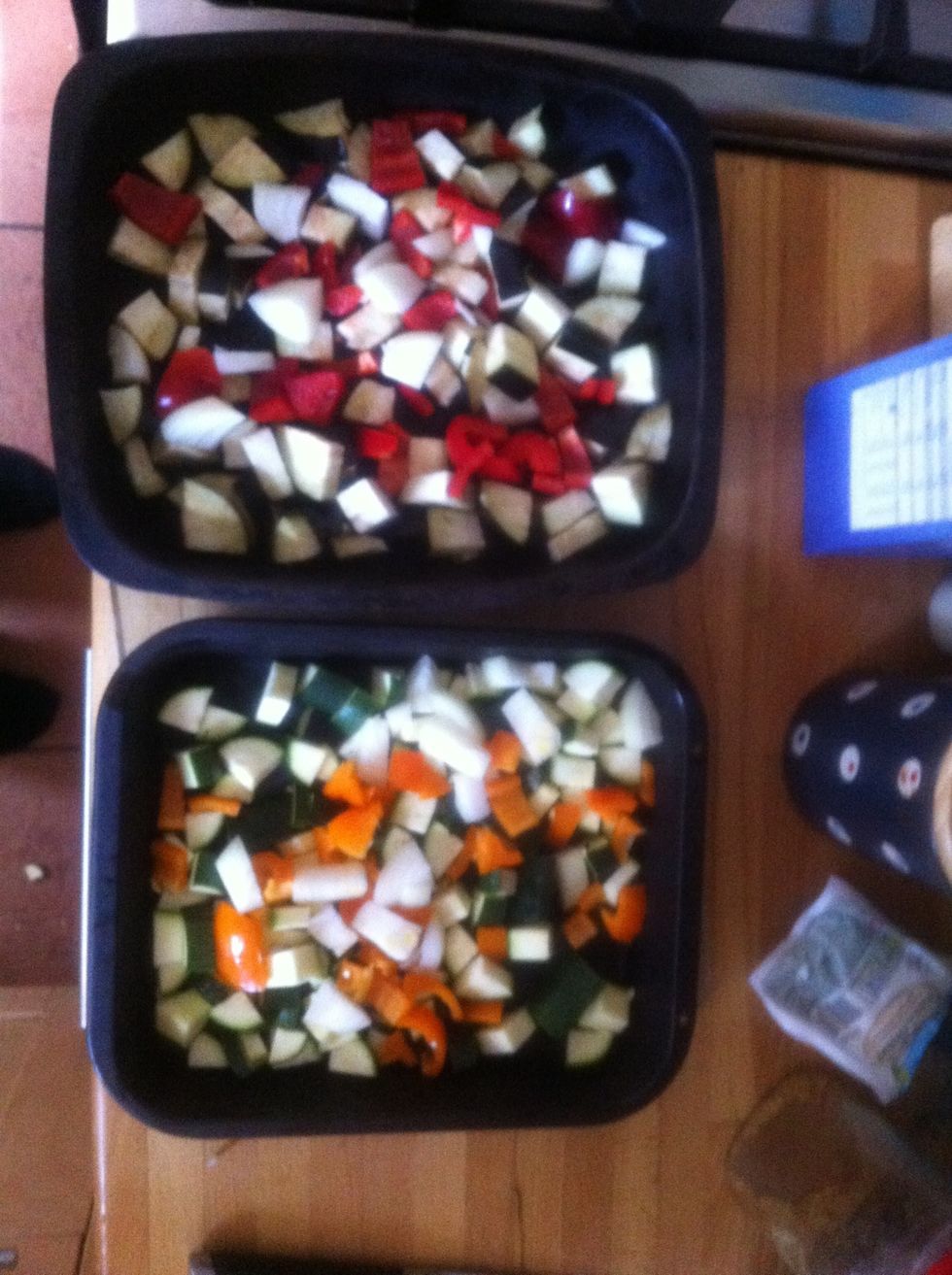 Chop the onion and share between both tins.