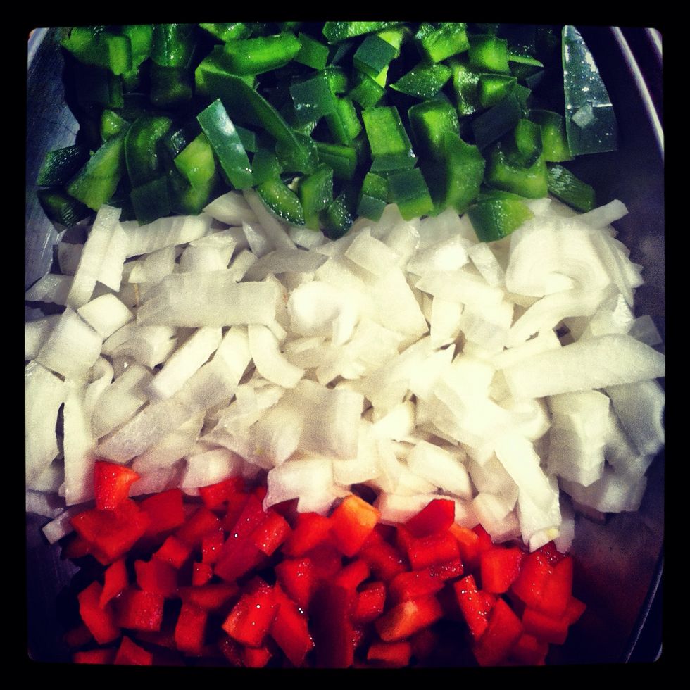Chop the onion and the peppers into small pieces about 1/2 cm.