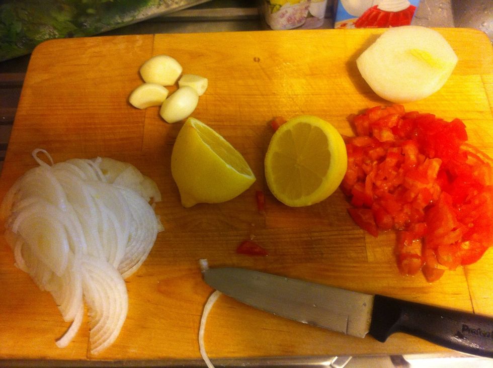 Chop the onion and the tomato