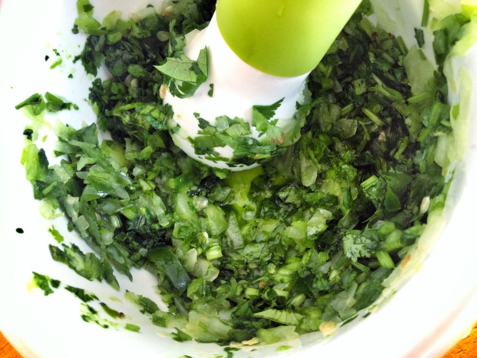 Chop the onion, chillies and coriander and grind in a mortar & pestle with salt. This step is critical, of course you can only chop them but you would have missed the whole point of this recipe.