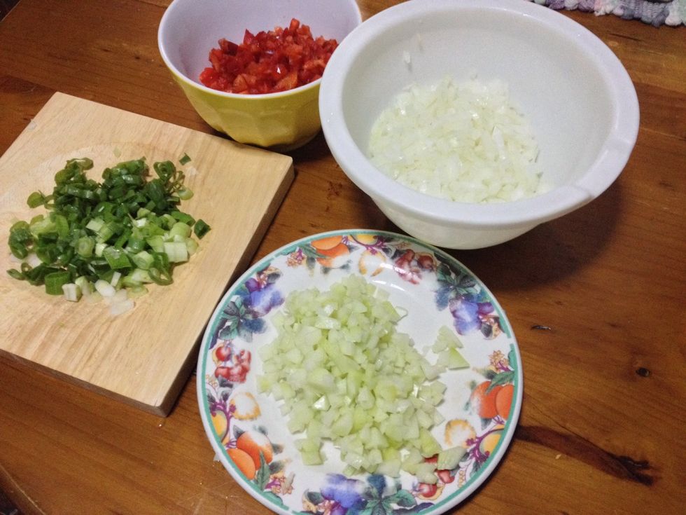 Chop the onion, red pepper, green onion, chayote, garlic and ginger :)