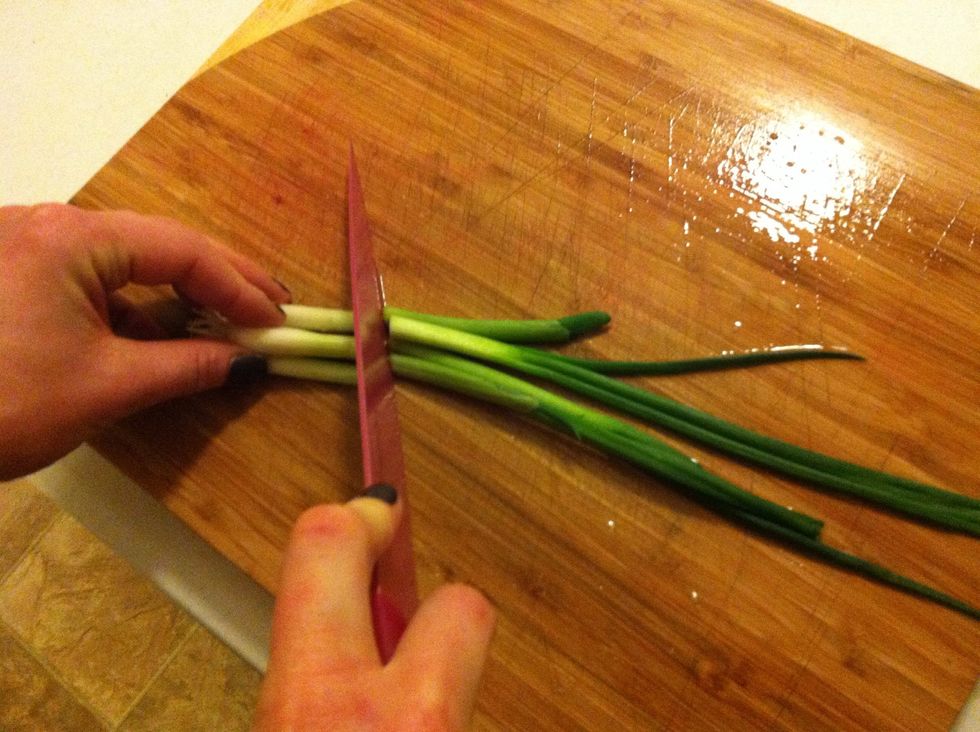 Chop the onions how ever you want but stopping at the end near the roots...