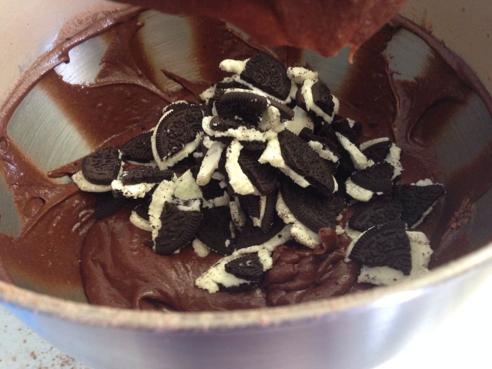 Chop the Oreo biscuits into small pieces and add to the brownie mix and stir until combined. Don't stir too much or the biscuits will break up, you want fairly large chunks of cookie in the mixture.
