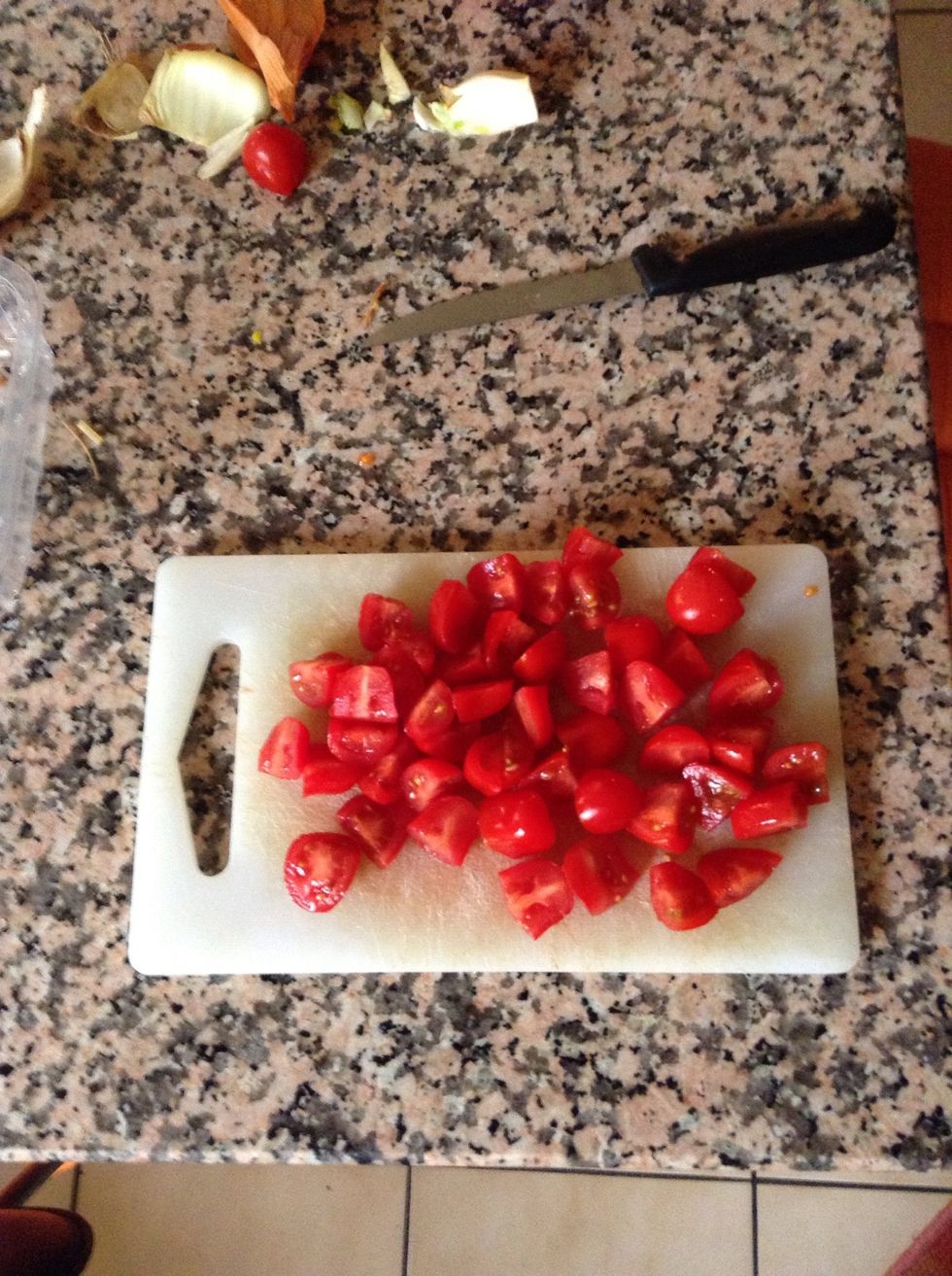 Chop the Pachino tomatoes.