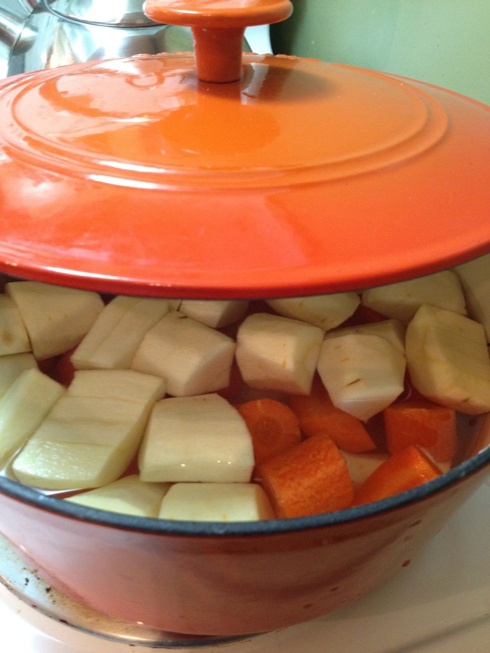 Chop the parsnips and carrots into chunks, and put into a pot with water covering the veggies as best you can(they'll float). Boil on HIGH until they are soft(i.e. you can put a fork through them).