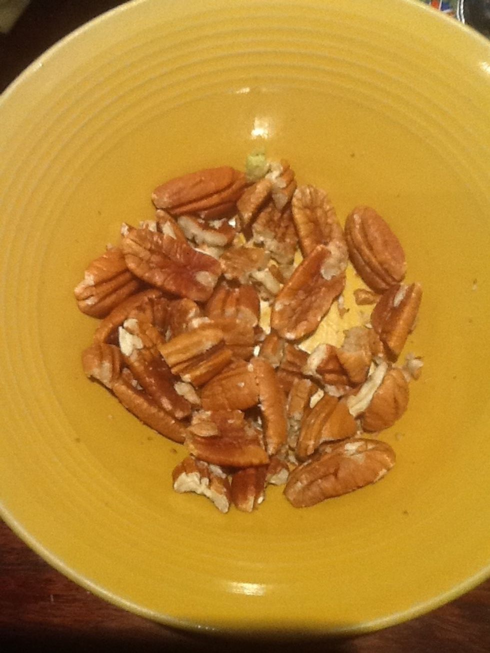 Chop the pecan nuts into small bits.