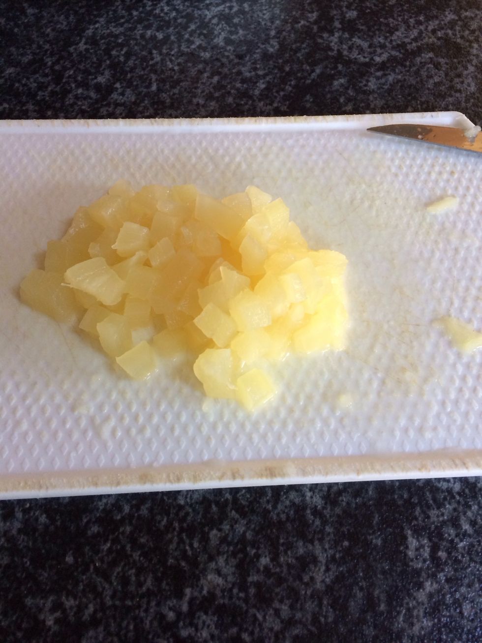 Chop the pineapple into small cubes.