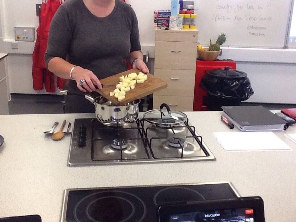 chop the potatoes and put them in the souce pan
