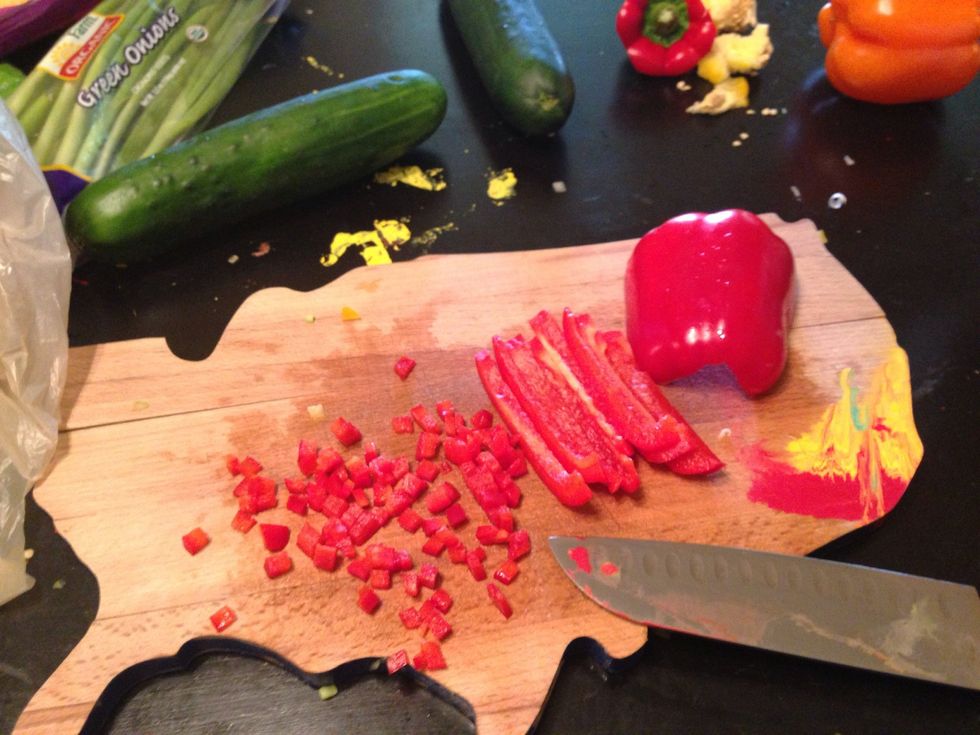 Chop the red peppers.